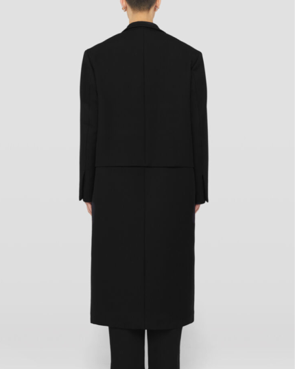 Single-breasted virgin wool coat with horizontal pleat