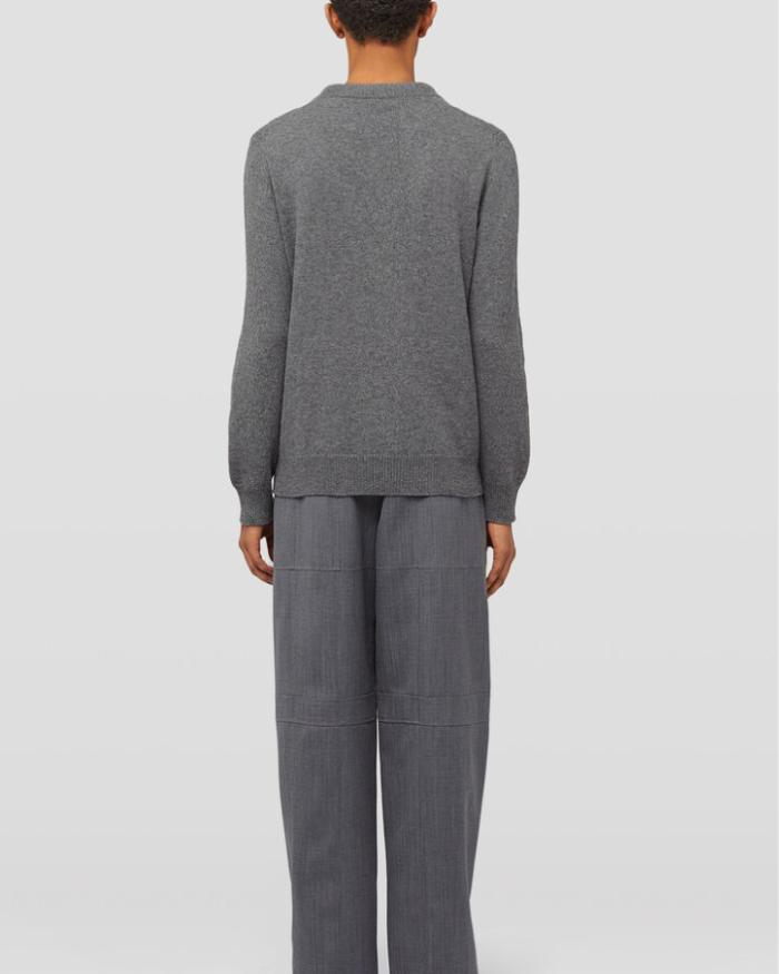 Long-sleeved merino wool sweater with front padded plastron